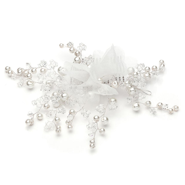 Handmade haircomb made with snowflake-inspired pearls and Swarovski stones